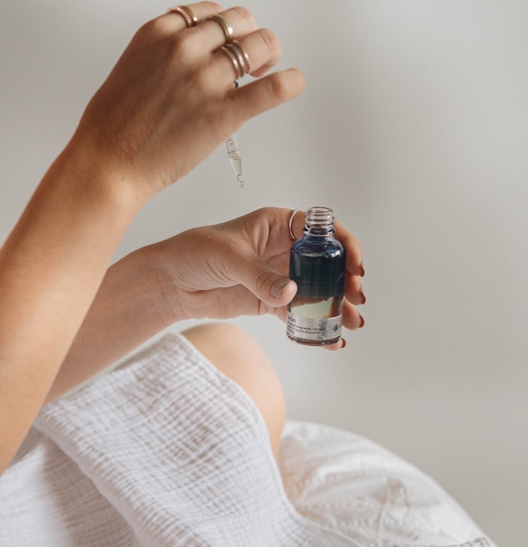 ExoScalp daily hair support serum applied with a dropper
