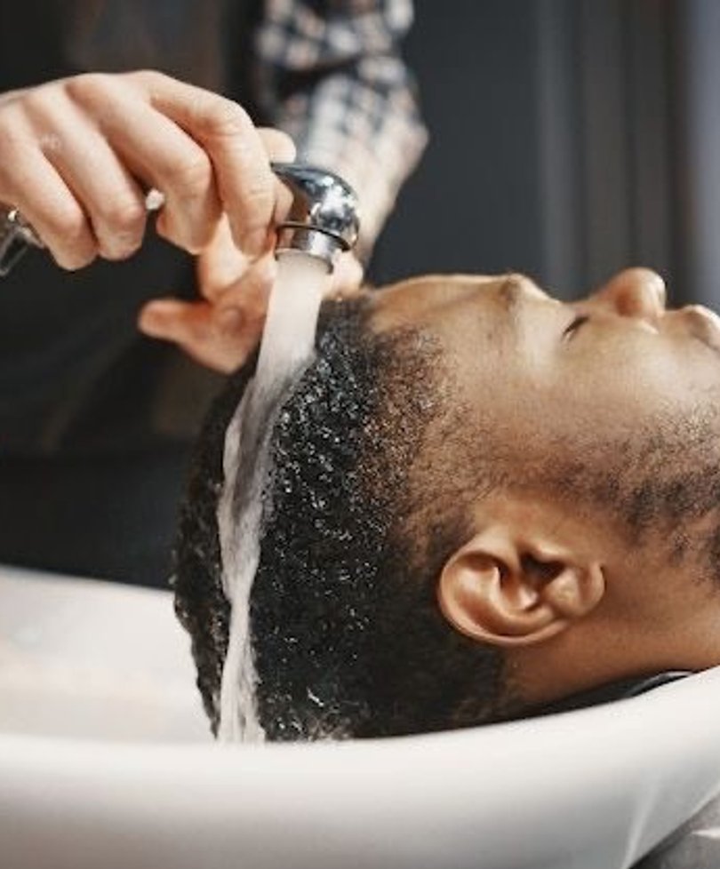 Client having his scalp washed at the EXOHAIR MD Scottsdale clinic